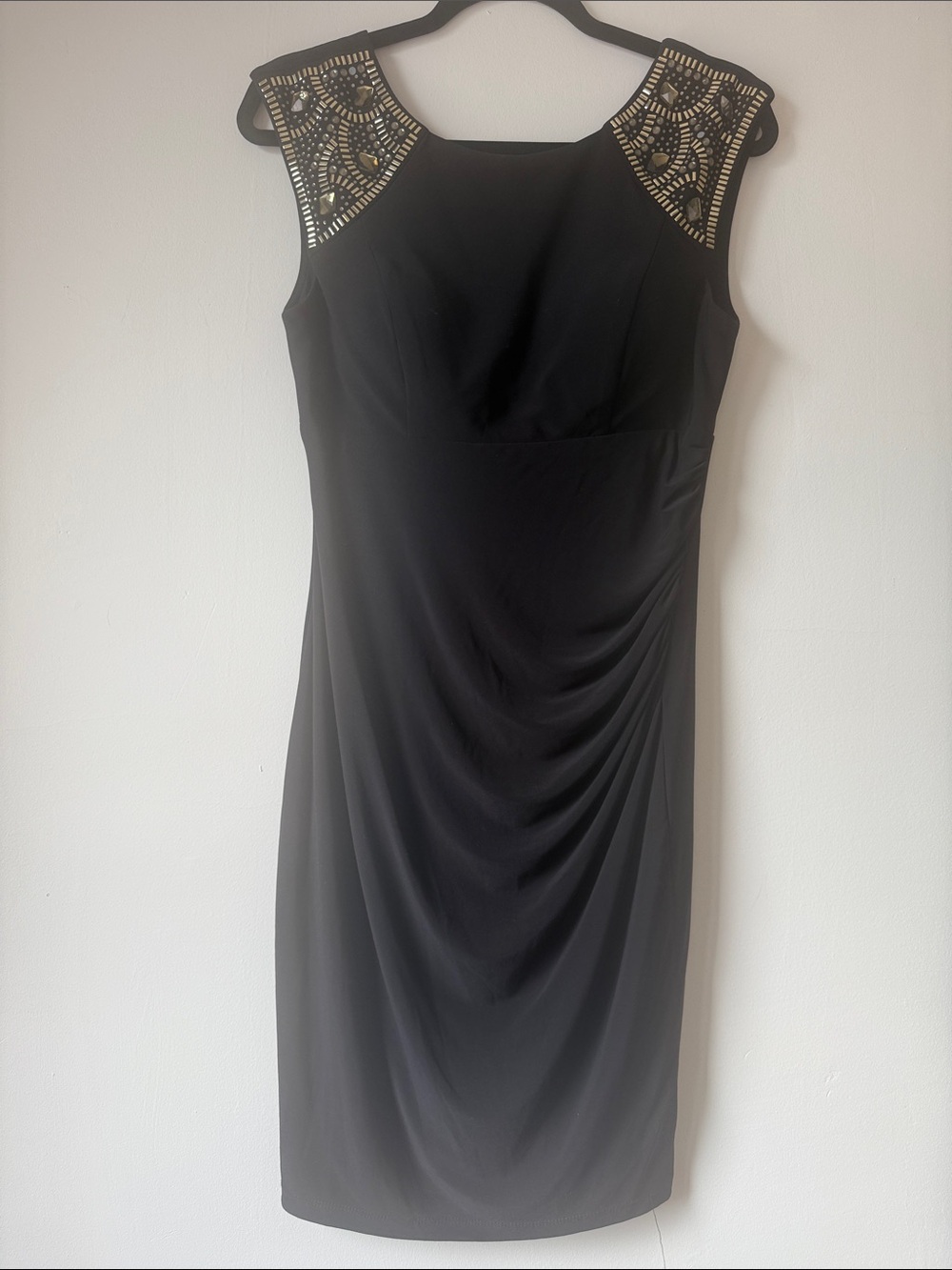 Elegant Black Sleeveless Dress with Beaded Shoulders